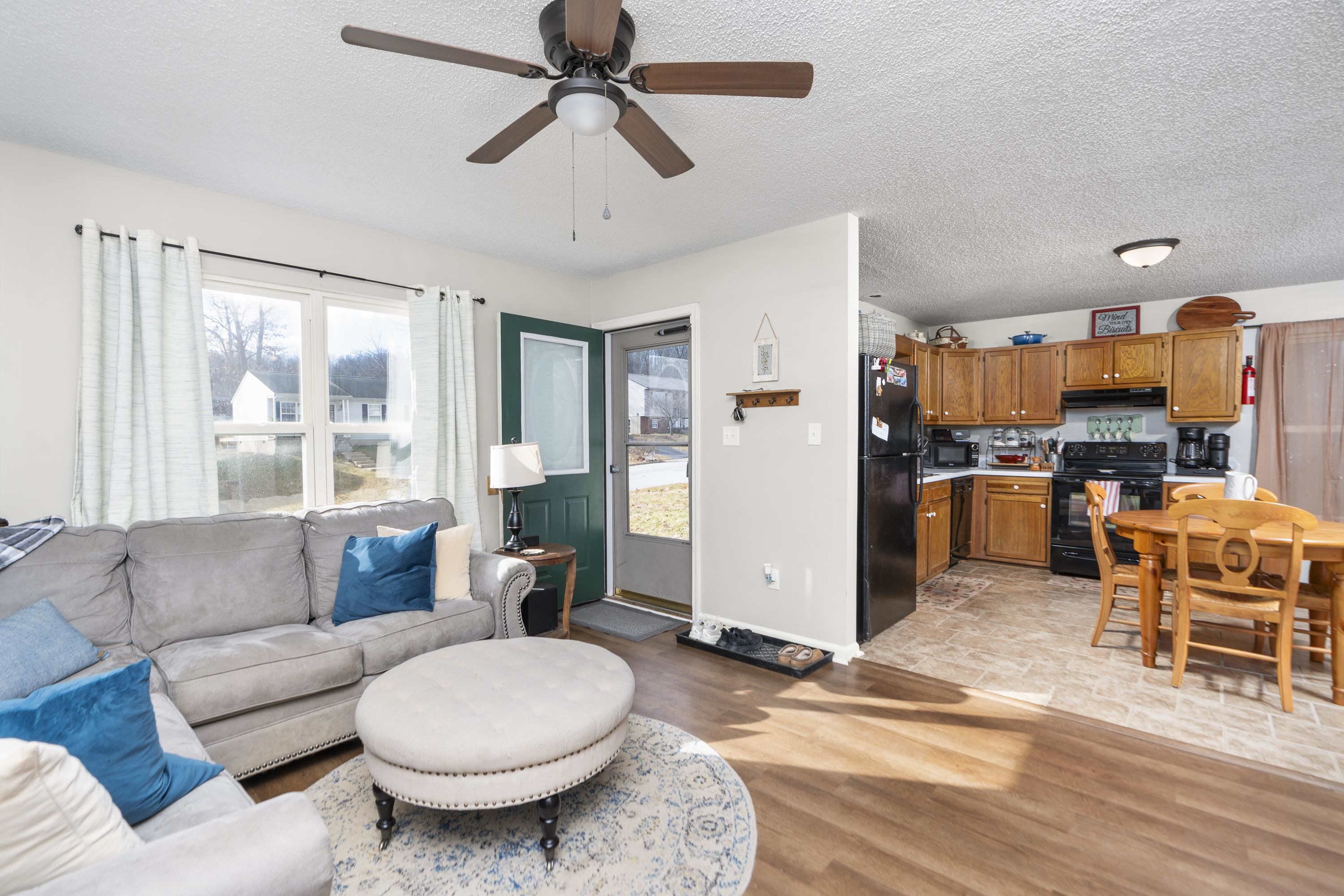 1625 D Street Waynesboro, VA 22980 - Photo 4 of 33 a living room with furniture and kitchen view