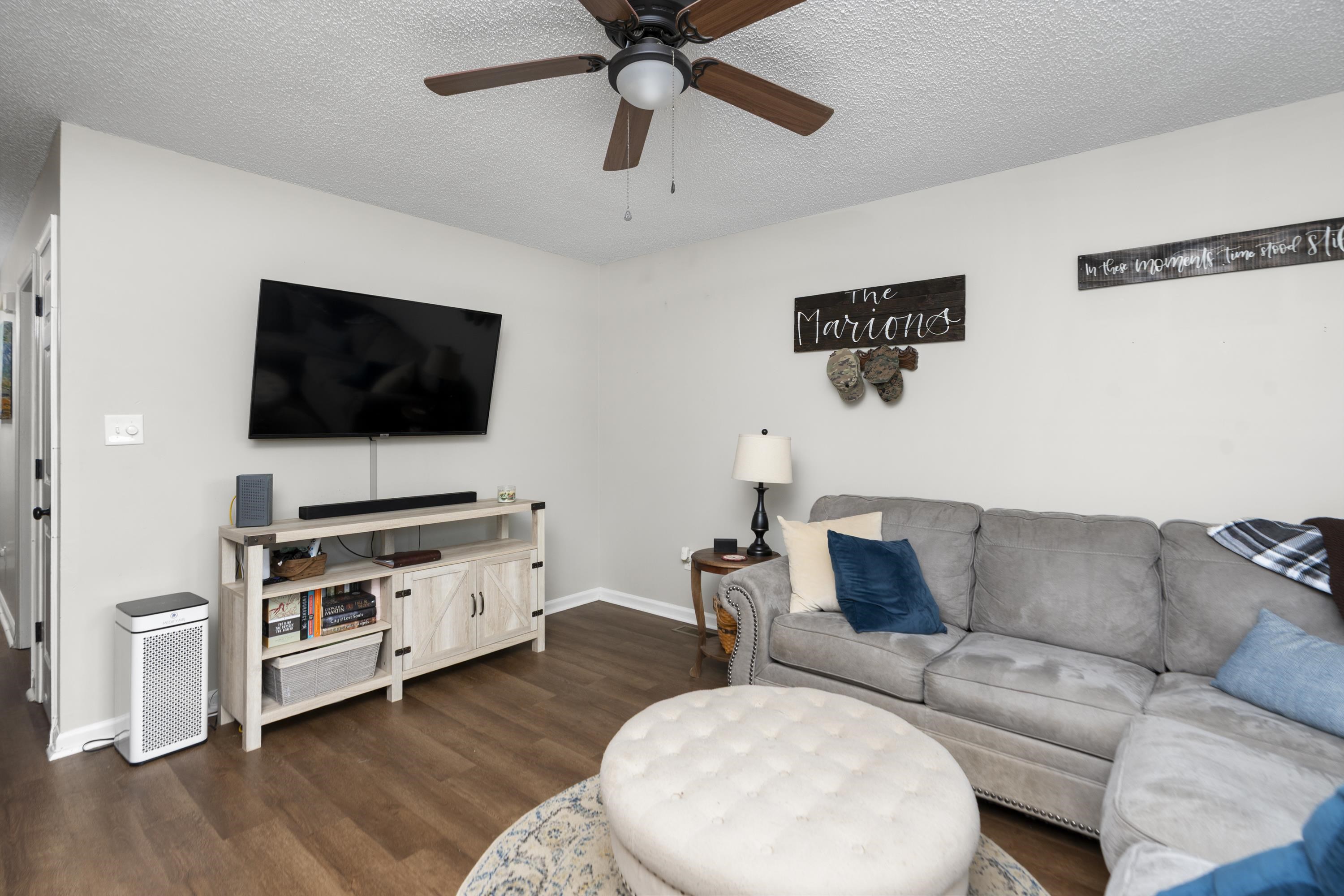 1625 D Street Waynesboro, VA 22980 - Photo 5 of 33 a living room with furniture and a flat screen tv