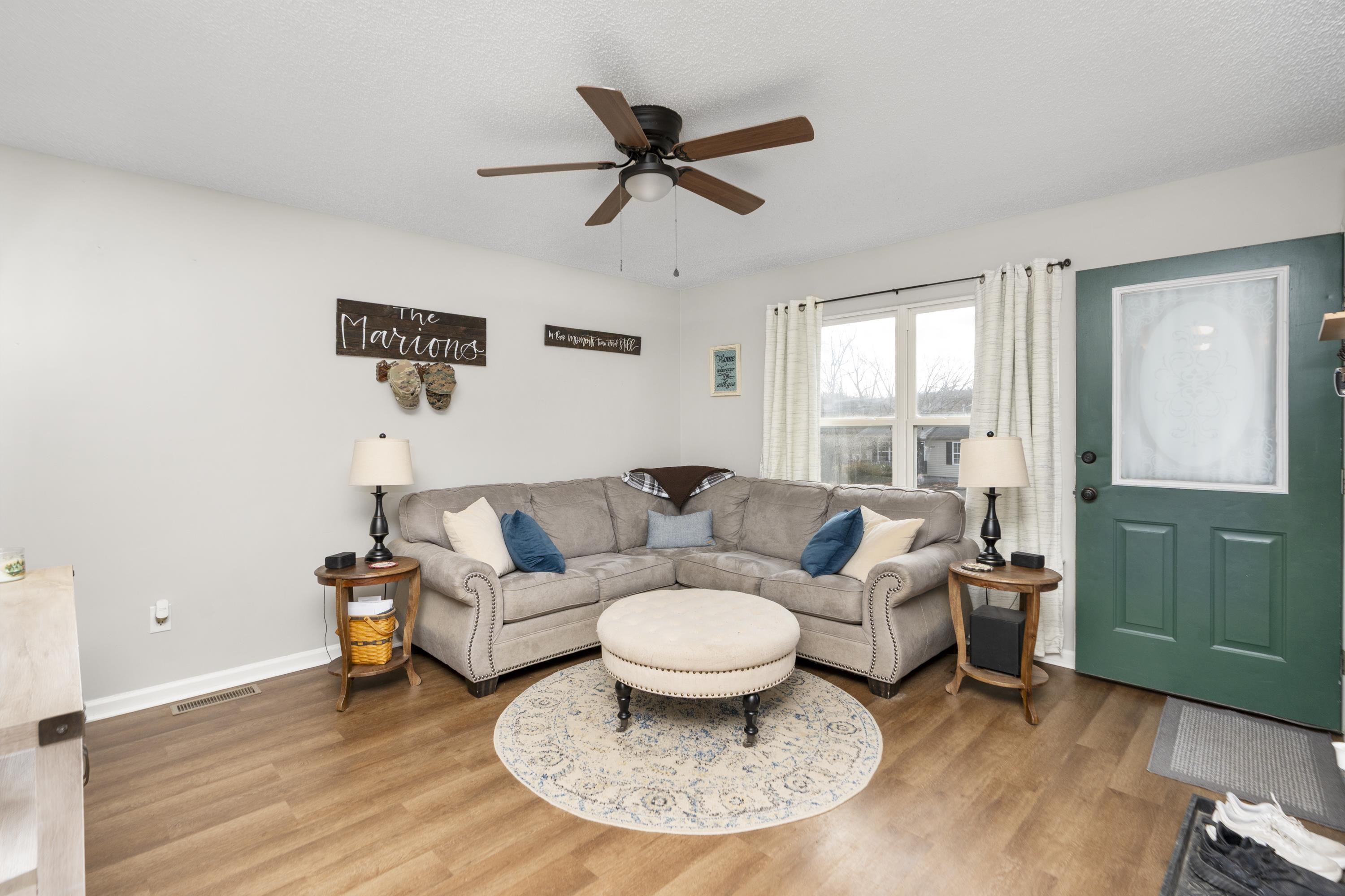 1625 D Street Waynesboro, VA 22980 - Photo 6 of 33 a living room with furniture and a wooden floor
