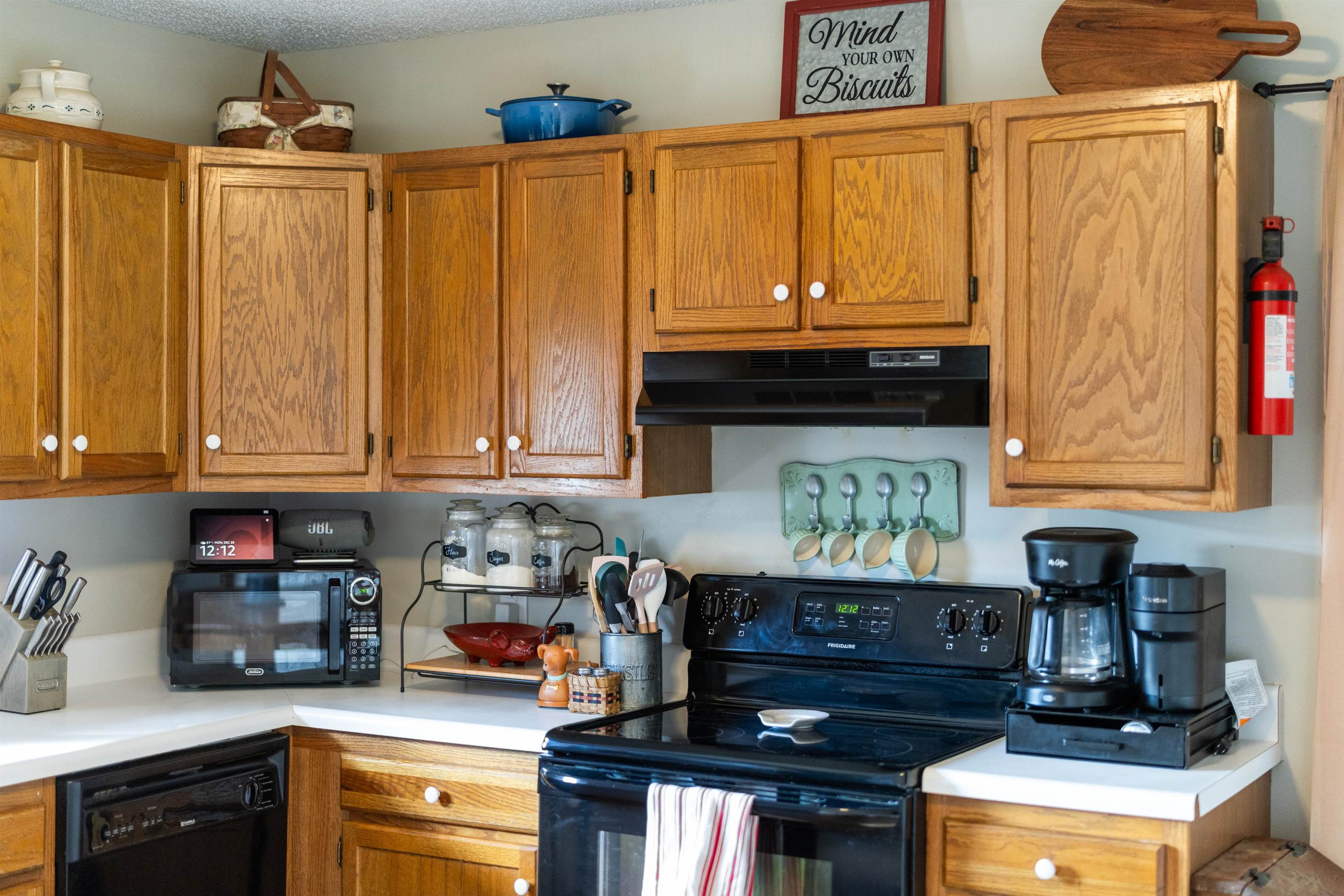 1625 D Street Waynesboro, VA 22980 - Photo 9 of 33 a kitchen with stainless steel appliances granite countertop a stove and cabinets