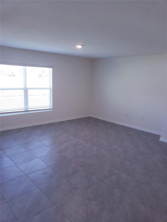 12211 Kingsley Trail Parrish, FL 34219 - Photo 17 of 28 an empty room with a window