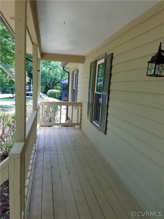 7835 Brightridge Road Chesterfield, VA 23832 - Photo 13 of 18 a view of a balcony with wooden floor