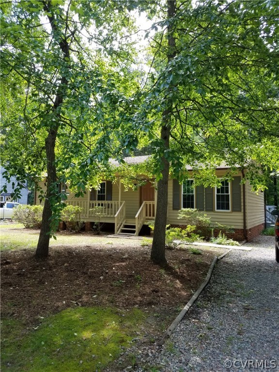 7835 Brightridge Road Chesterfield, VA 23832 - Photo 2 of 18 a view of a trees in front of a house with a tree
