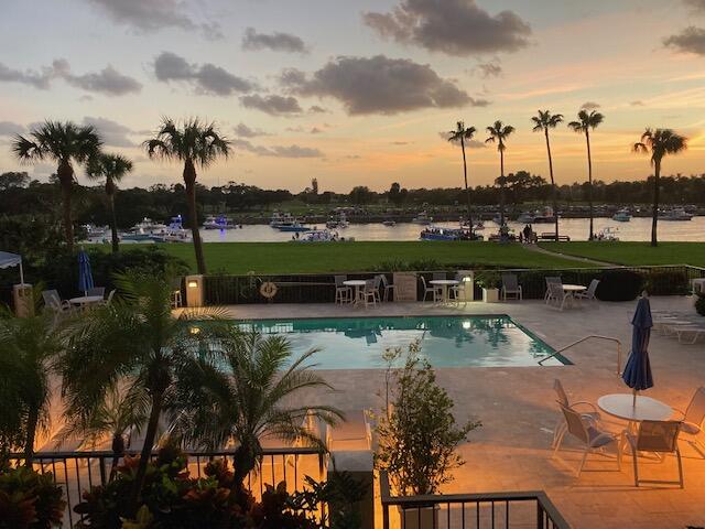 356 Golfview Road, Unit 204 North Palm Beach, FL 33408 - Photo 24 of 71 a view of a swimming pool and outdoor seating