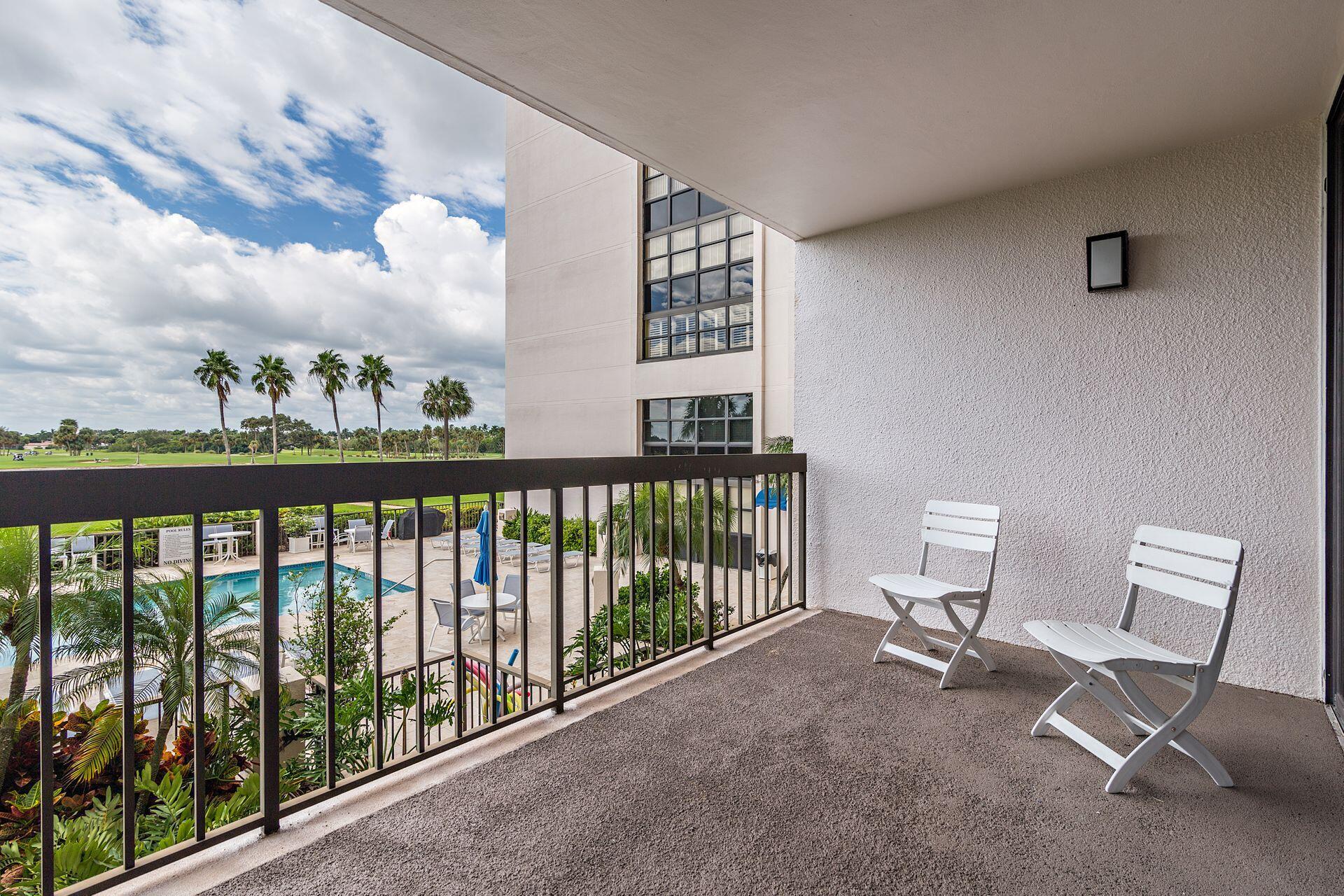 356 Golfview Road, Unit 204 North Palm Beach, FL 33408 - Photo 25 of 71 a view of a chair and table in the balcony