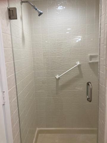 356 Golfview Road, Unit 204 North Palm Beach, FL 33408 - Photo 27 of 71 a bathroom with a shower