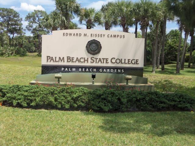 356 Golfview Road, Unit 204 North Palm Beach, FL 33408 - Photo 40 of 71 a green field with trees in the background