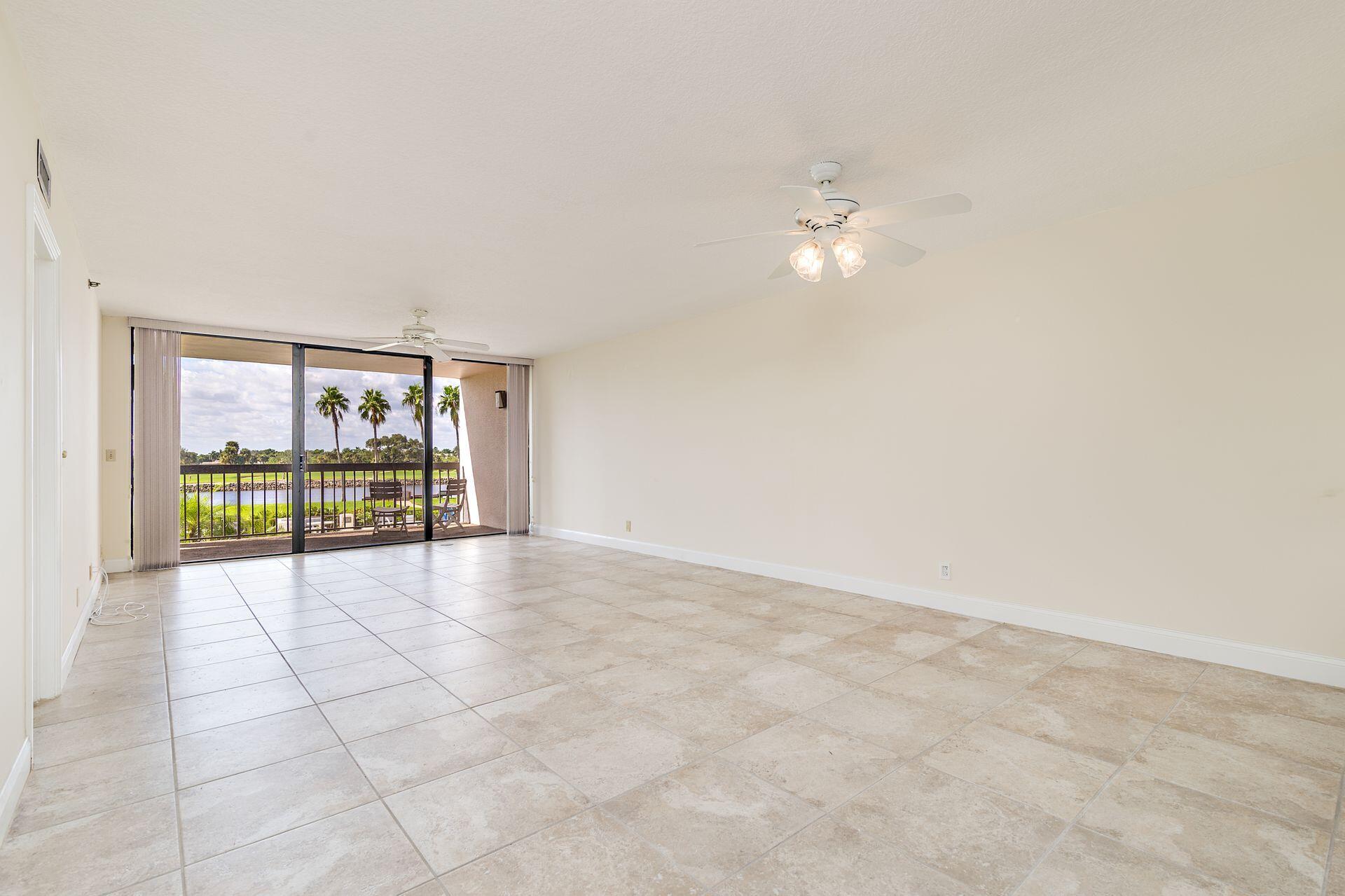 356 Golfview Road, Unit 204 North Palm Beach, FL 33408 - Photo 50 of 71 a view of an empty room with a window