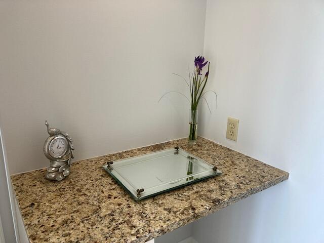 356 Golfview Road, Unit 204 North Palm Beach, FL 33408 - Photo 65 of 71 a bathroom with a granite countertop sink and a mirror