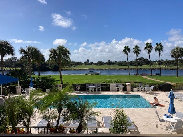 356 Golfview Road, Unit 204 North Palm Beach, FL 33408 - Photo 66 of 71 an aerial view of a house with a garden and lake view