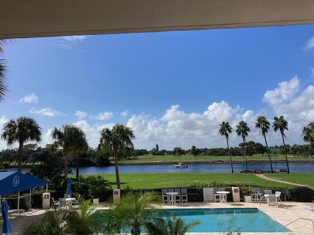 356 Golfview Road, Unit 204 North Palm Beach, FL 33408 - Photo 68 of 71 a view of a lake with houses in the back