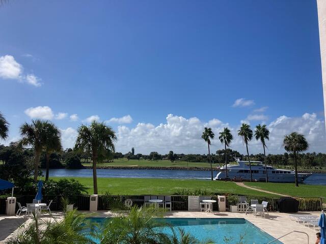 356 Golfview Road, Unit 204 North Palm Beach, FL 33408 - Photo 69 of 71 a view of a lake with houses in the background