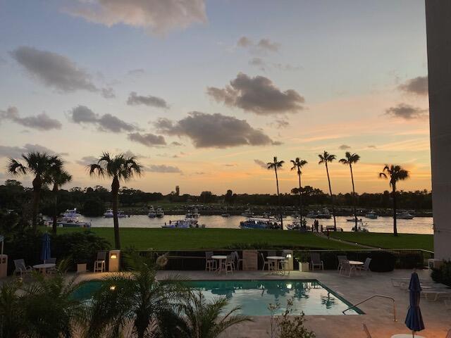 356 Golfview Road, Unit 204 North Palm Beach, FL 33408 - Photo 70 of 71 a view of a lake with a big yard