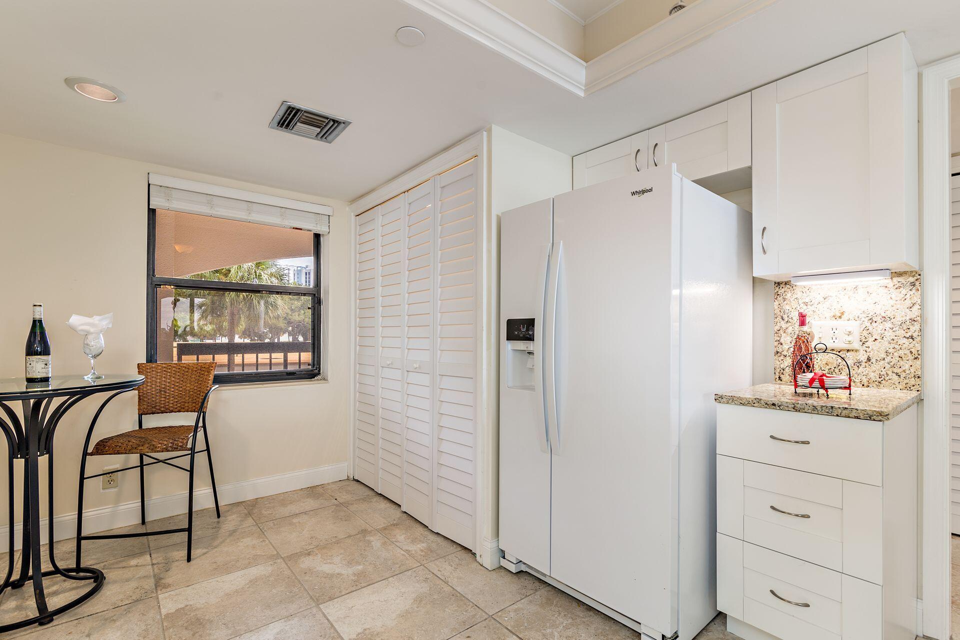 356 Golfview Road, Unit 204 North Palm Beach, FL 33408 - Photo 7 of 71 a view of a livingroom with furniture and a window