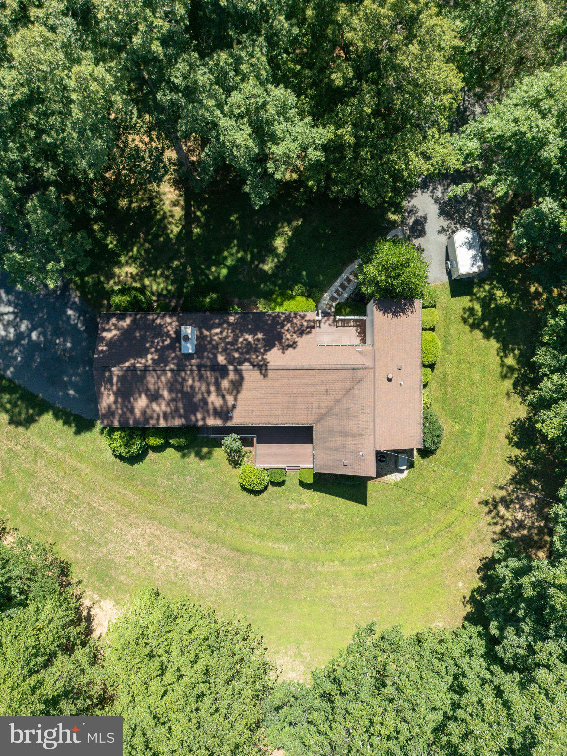 6067 Pilgrims Rest Road Broad Run, VA 20137 - Photo 43 of 58 Serene home nestled in lush greenery.