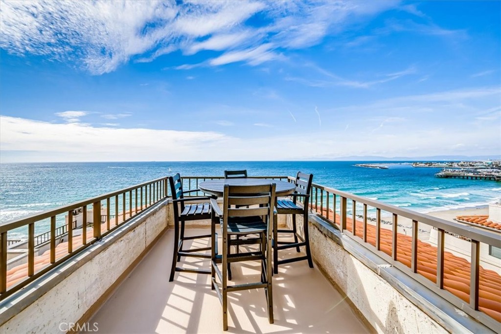 555 Esplanade, Unit 518 Redondo Beach, CA 90277 - Photo 13 of 73 a view of a city from a balcony with outdoor seating
