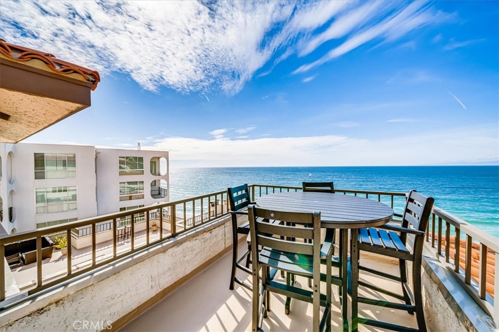 555 Esplanade, Unit 518 Redondo Beach, CA 90277 - Photo 14 of 73 a view of a chairs and table in the balcony
