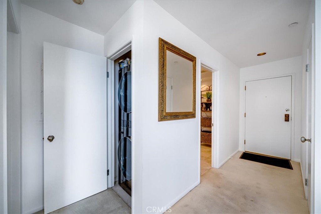 555 Esplanade, Unit 518 Redondo Beach, CA 90277 - Photo 26 of 73 a view of an entryway with wooden floor