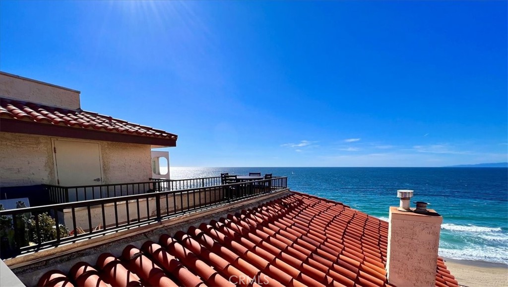 555 Esplanade, Unit 518 Redondo Beach, CA 90277 - Photo 47 of 73 a view of roof deck with wooden floor and fence