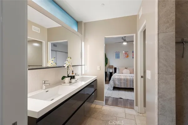 a view of a livingroom with furniture and staircase