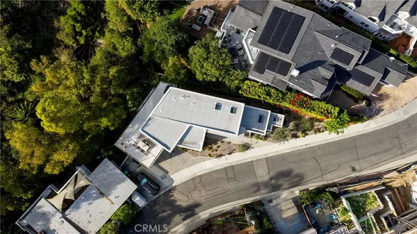 a view of a lake in middle of forest