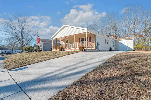 a view of a house with a garage