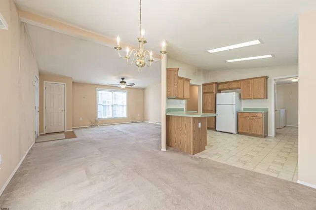 a view of a kitchen with a sink and dishwasher kitchen view