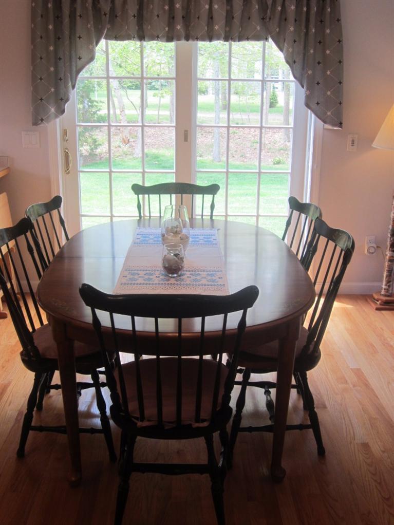 10 Captain Kidd Road East Sandwich, MA 02537 - Photo 12 of 31 a view of a dining room with furniture and wooden floor