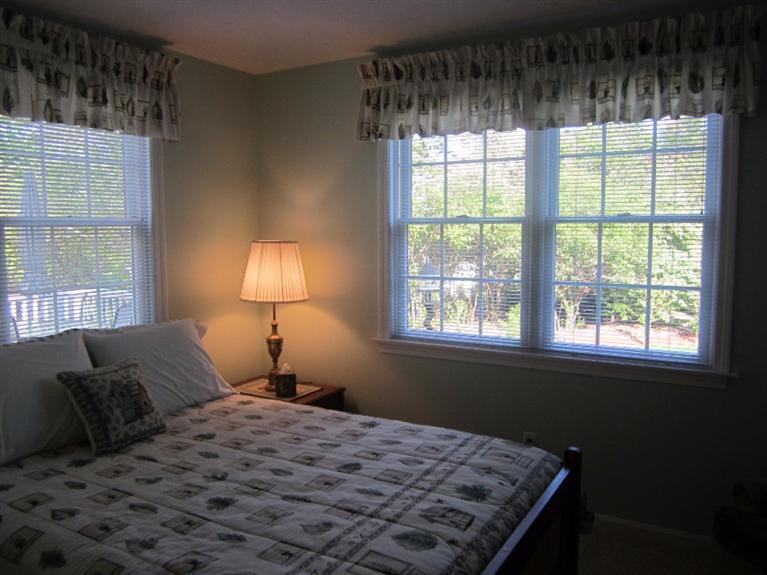 10 Captain Kidd Road East Sandwich, MA 02537 - Photo 13 of 31 a bedroom with a bed and a window