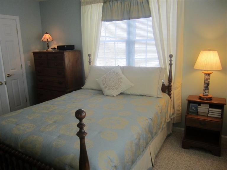 10 Captain Kidd Road East Sandwich, MA 02537 - Photo 15 of 31 a bedroom with a bed and a window