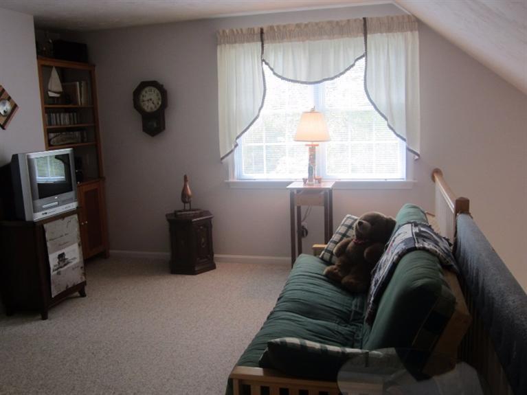 10 Captain Kidd Road East Sandwich, MA 02537 - Photo 19 of 31 a living room with furniture and a window