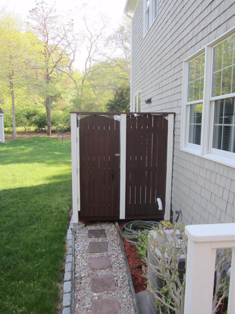 10 Captain Kidd Road East Sandwich, MA 02537 - Photo 26 of 31 a view of a wooden door in front of a house