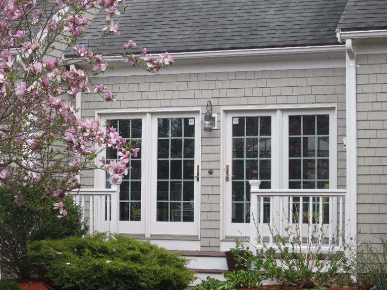 10 Captain Kidd Road East Sandwich, MA 02537 - Photo 4 of 31 front view of a house with a flowers
