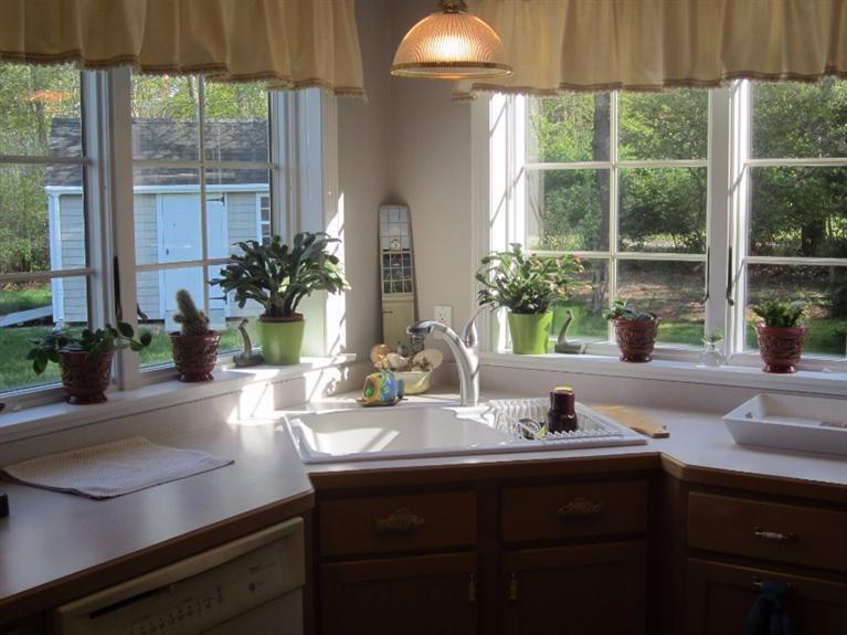 10 Captain Kidd Road East Sandwich, MA 02537 - Photo 7 of 31 a kitchen with a sink and a large window
