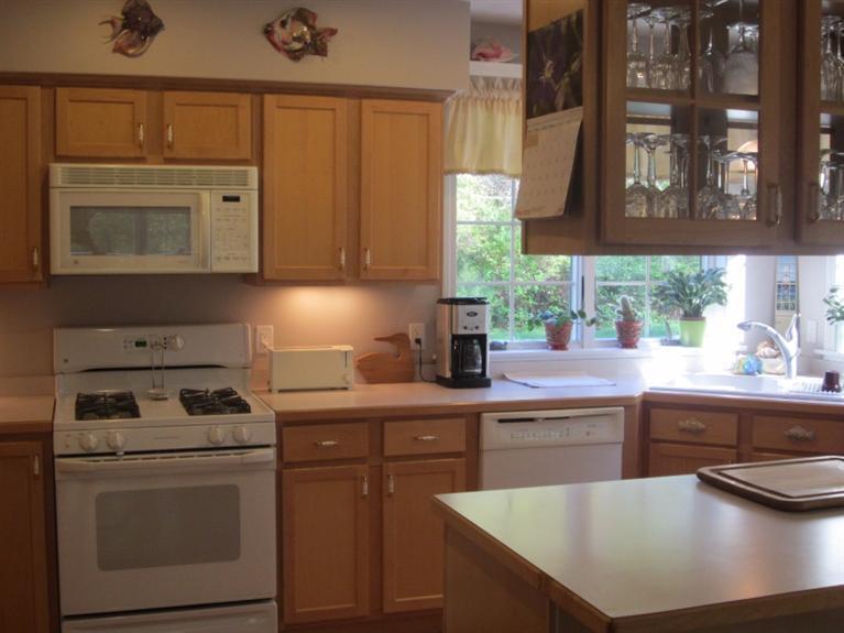 10 Captain Kidd Road East Sandwich, MA 02537 - Photo 8 of 31 a kitchen with cabinets and window