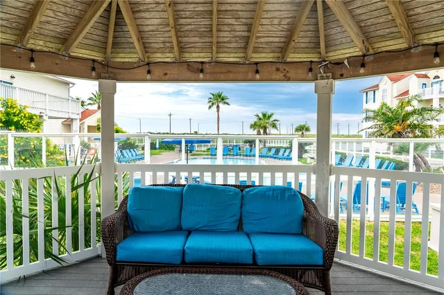a view of a two chairs in the deck