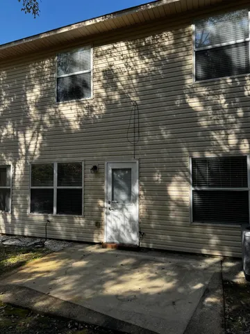 a view of house with yard