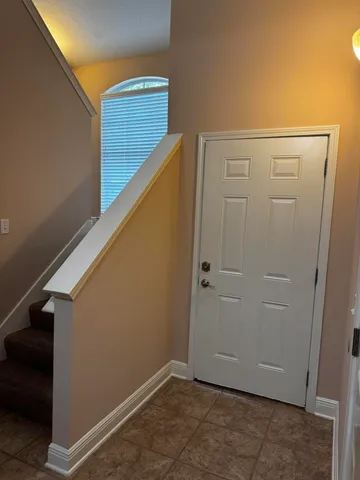 a view of hallway with stairs