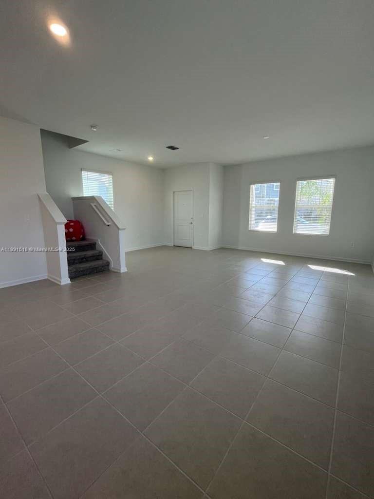5984 Zen Way, Unit 5984 Clermont, FL 34714 - Photo 27 of 51 a view of a livingroom with a staircase