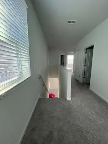 a view of storage and utility room