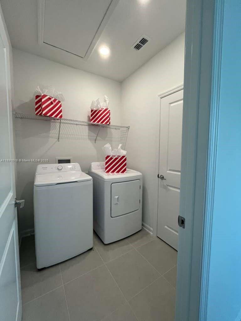 5984 Zen Way, Unit 5984 Clermont, FL 34714 - Photo 8 of 51 a utility room with dryer and washer