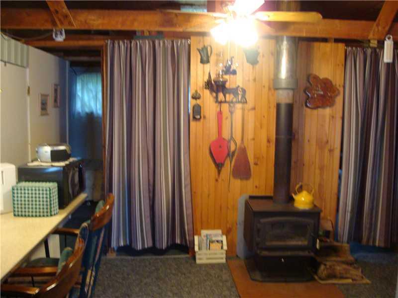 705 Little Madawaska Lake Road Stockholm, ME 04783 - Photo 5 of 11 Living Room. Wood Stove