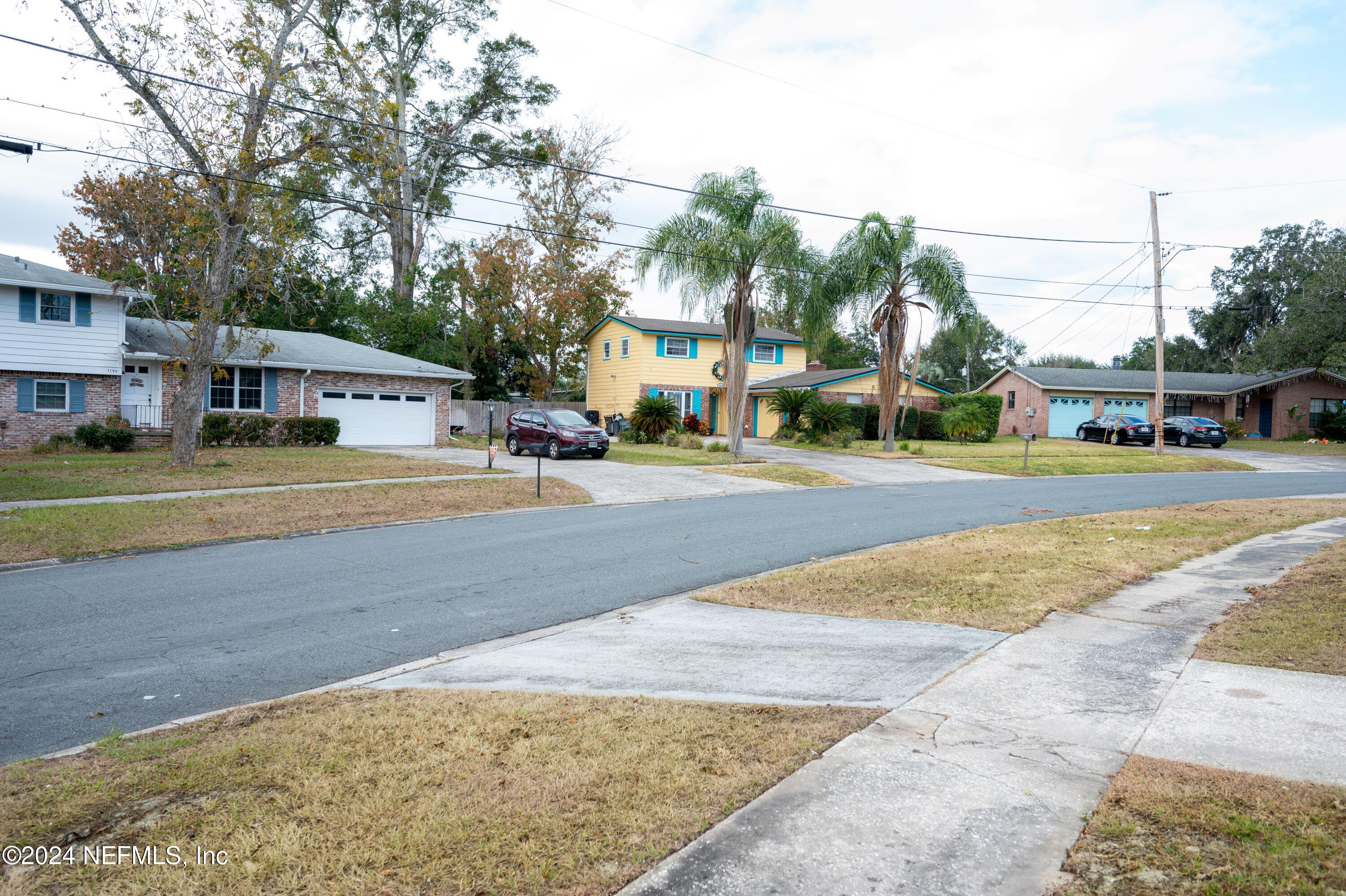 1195 Pecan Cove Jacksonville, FL 32221 - Photo 54 of 54 a building with trees in front of it