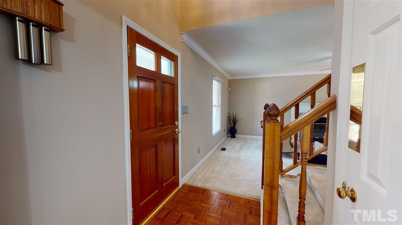 4232 Birmingham Way Raleigh, NC 27604 - Photo 17 of 30 a view of an entryway with staircase