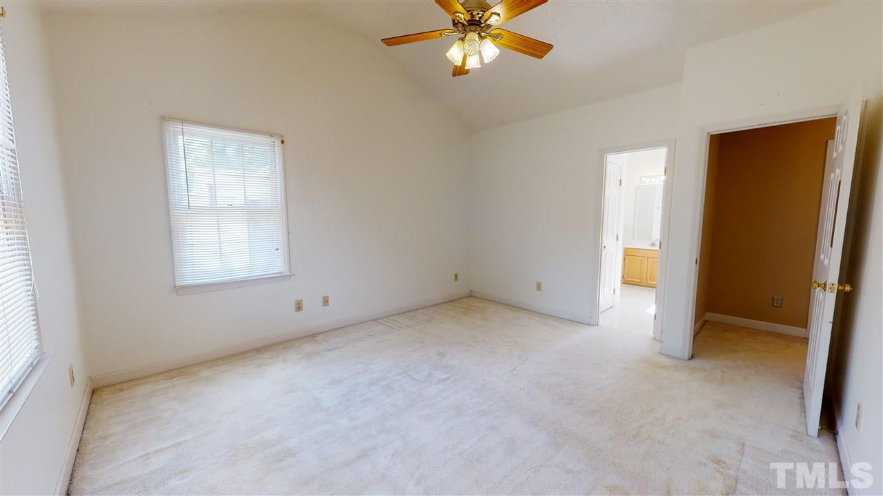 4232 Birmingham Way Raleigh, NC 27604 - Photo 21 of 30 an empty room with a window and closet area