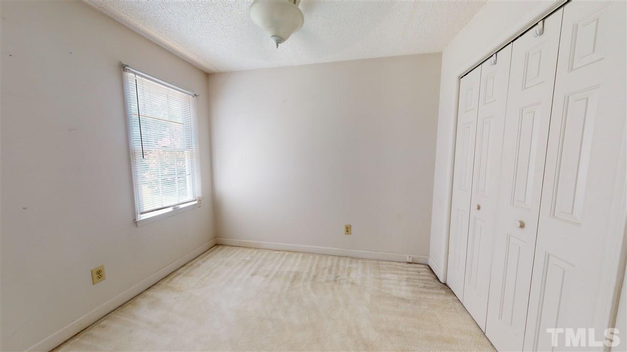 4232 Birmingham Way Raleigh, NC 27604 - Photo 24 of 30 a view of an empty room with a window