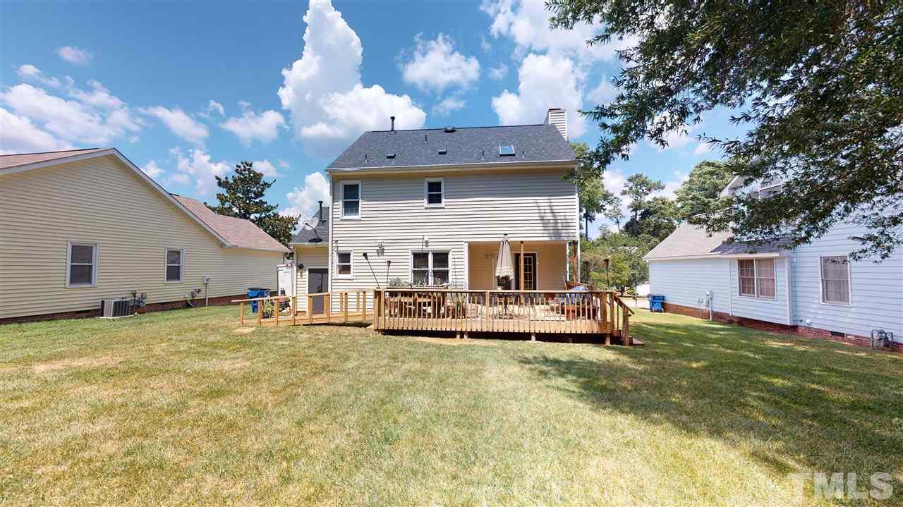 4232 Birmingham Way Raleigh, NC 27604 - Photo 29 of 30 a view of a house with a yard and sitting area