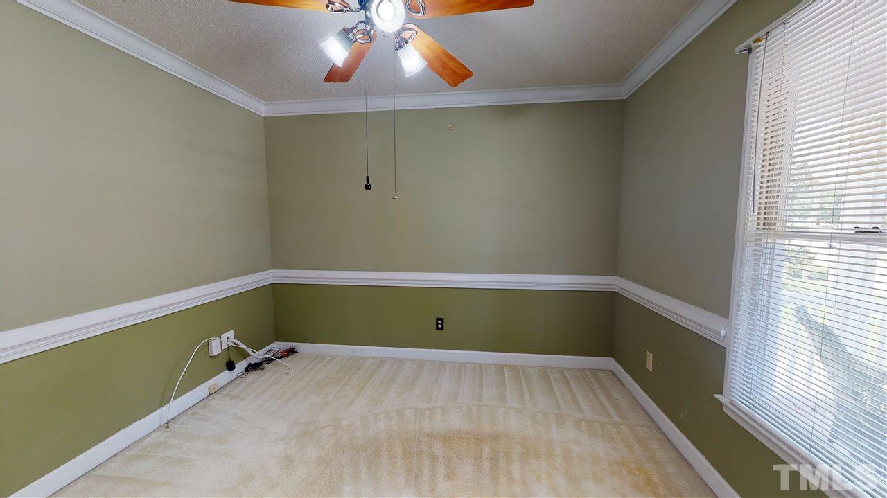 4232 Birmingham Way Raleigh, NC 27604 - Photo 7 of 30 a room with toys and wooden floor