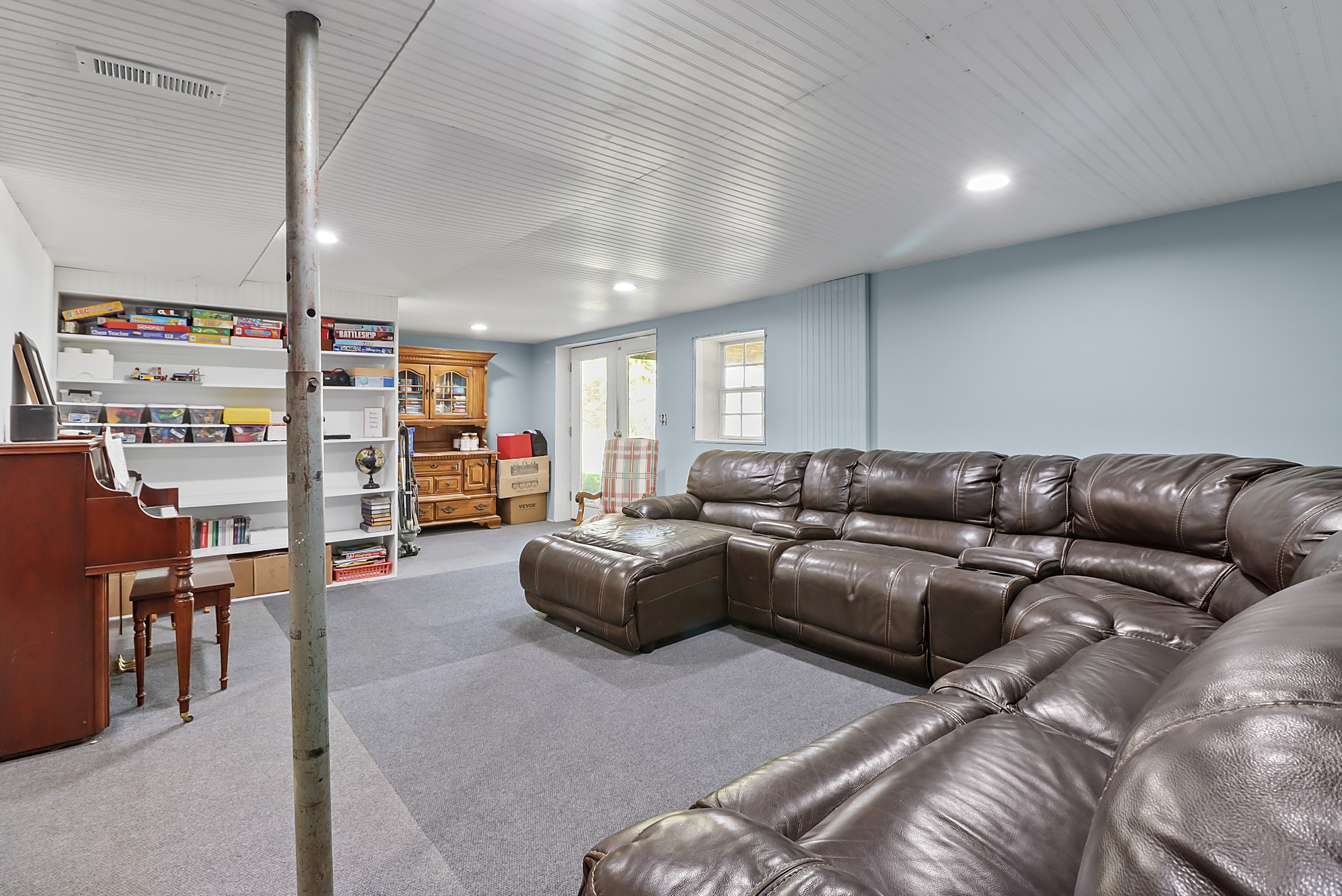 4369 Washington Road Greenbrier, TN 37073 - Photo 30 of 30 a living room with furniture and a flat screen tv