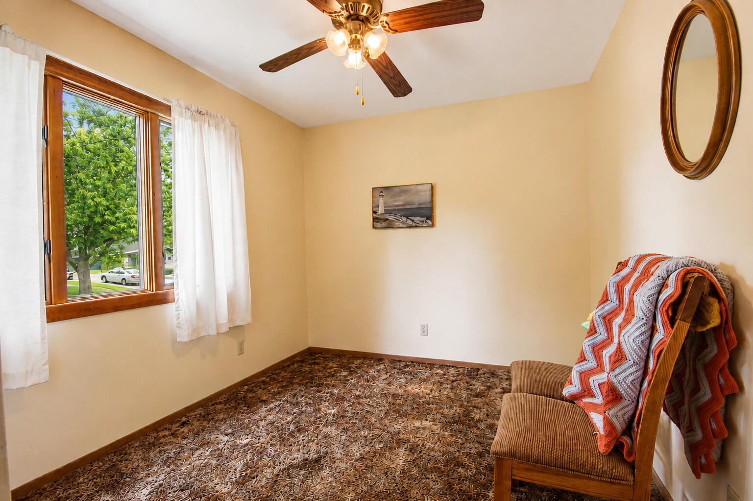 9502 Forrest Drive Highland, IN 46322 - Photo 15 of 27 a bedroom with a bed and a chandelier